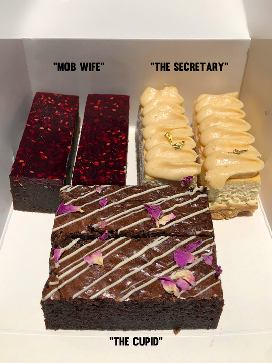 Valentine's Day Dessert Box featuring six gluten free dessert bars: chocolate mud cake with raspberry pate, rose petal brownies, and cheesecake bars